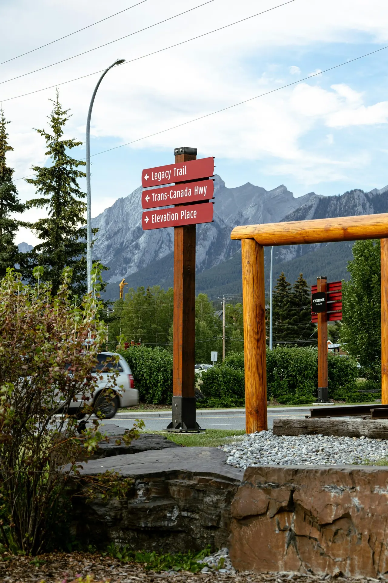 Adirondack chairs looking out at the Canmore mountains